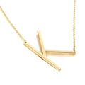 Minimalist gold titanium necklace featuring a polished uppercase letter K pendant charm - Style K (KN25654-K)