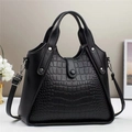 Classic black crocodile pattern handbag with dual handles and adjustable shoulder strap - Black