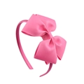 Detail of a pink headband featuring a large textured layered ribbon bow for children - Pink