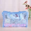 Neceser de PVC transparente azul con estampado de margaritas y asa azul - Azul