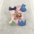 Detail of 5-piece children hair clip set with denim bows, crown, and elephant on card - Denim Series 5-Piece Set