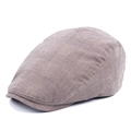 Classic British style flat cap featuring brown-grey plaid pattern and textured fabric - Adjustable / Khaki