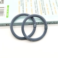 Set of two gray-blue knitted elastic hair ties with square buckles on a book - Two-Piece Set / Light Blue