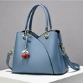 Haze blue large capacity crossbody handbag with V-shaped stitching and cherry charm - Blue
