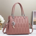 Elegant dusty rose leather handbag with geometric texture and moon pendant charm - Dusky Pink
