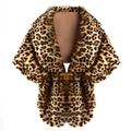 Detailed macro texture of leopard print faux fur shawl with soft brown and black patterns - Leopard Print