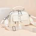 Chic beige multi-pocket crossbody bag with adjustable wide strap and silver hardware - White