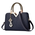 Navy blue structured handbag with geometric embossing and braided gold handle - Dark Blue