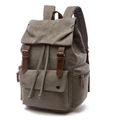 Dark grey canvas backpack with brown leather straps and vintage drawstring closure - Gray