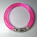 Pink LED glowing acrylic bracelet with bubble texture and visible power switch - Pink Bubble Style