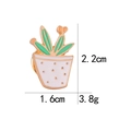 Detailed size view of a cartoon cactus enamel pin with measurements 2.2cm and 1.6cm - Potted Cactus