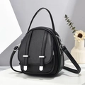 Black pebbled leather mini backpack with silver hardware and versatile straps for women - Black