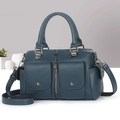 Detail of blue lychee grain leather handbag with dual pockets and metallic hardware - Blue
