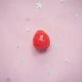 Detailed view of red resin strawberry charms with realistic texture for DIY crafts - 3D Strawberry Medium 1.7x1.9cm