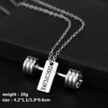 Detailed view of silver dumbbell necklace featuring engraved Discipline plate and dimensions - DISCIPLINE Dumbbell