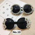 Chic round sunglasses with pearl embellishments and white daisy floral accents - No. 10 (Pearl Daisy)