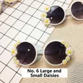 White round frame sunglasses featuring decorative 3D daisy flowers and dark lenses - No. 6 (Big & Small Daisy)