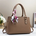 Elegant brown pebbled leather handbag for women with patterned silk scarf accessory - Coffee