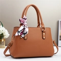 Elegant caramel brown lychee leather handbag with decorative silk scarf and gold hardware - Khaki/Earth Yellow