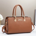 Detailed side view of brown faux leather crossbody bag with lychee texture and gold hardware - Khaki/Earth Yellow