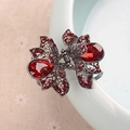 Vintage hair claw clip in dark grey metal featuring large red teardrop-shaped crystals - Lotus / Gunmetal Red