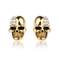 Golden skull stud earrings with white crystals shown with a mirror reflection - Skull (A00402) / 18K Gold