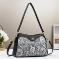 Elegant women's crossbody phone bag with black paisley patterns and golden hardware - Black