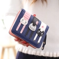 Short faux leather wallet for women with cute cat appliques in a tricolor design - Royal Blue