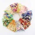 Colorful organza gift bags with gold rose patterns and drawstring closure for jewelry - Colorful