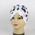Elastic cow print turban hat with a stylish cross-knot design in black and white finish - One Size / White Cow Pattern