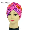 Multicolor print headwrap with front cross knot design in vibrant pink and purple patterns - One Size / Multi-color