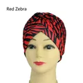 Stylish turban hat for women featuring vibrant red and black zebra print pattern - One Size / Red Zebra