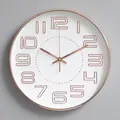 Modern 12-inch round wall clock with 3D embossed rose gold numerals and white dial - Rose Gold