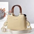 Beige woven handbag with amber acrylic handles and wide jacquard shoulder strap - Beige