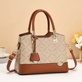 Elegante borsa a tracolla monogramma beige con manici in pelle marrone e parti dorate - Bianco Sporco