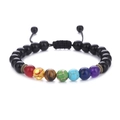 Macro detail of adjustable woven 7 chakra bead bracelet with natural tiger eye stones - Shiny Black