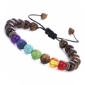 Adjustable 7 chakra yoga bracelet with tiger eye beads and braided cord in white background - Tiger Eye Stone Bracelet