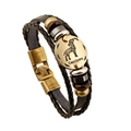 Detail of Capricorn vintage braided leather bracelet with bronze metal charm and beads - Capricorn