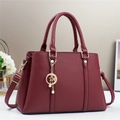 Large burgundy lychee pattern tote bag with gold hardware and star-moon charm pendant - Wine Red