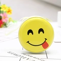 Round yellow tinplate coin purse featuring a classic winking smiley face with zipper - Emoji Tongue Out Yellow Style 03
