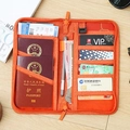 Orange travel document organizer with multi-card slots and passport compartments - Large / Orange
