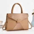 Detail of beige crossbody bag showing lychee leather texture and crocodile flap - Khaki