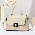 Elegant off-white crossbody handbag with gold buckle and top handle in a minimalist setting - White / Length 24 Width 8 Height 16