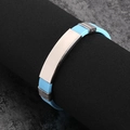 Sky blue silicone bracelet with polished silver metal plate on a display stand - Light Blue