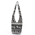 Ethnic canvas shoulder bag featuring black and white elephant and floral totem prints - Black