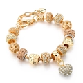 Detail shot of gold heart-shaped charm bracelet with sparkling crystals and snake chain - 17CM+5CM Extension Chain / PD0018-B