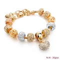 Macro detail of gold snake chain bracelet with sparkling crystal beads and heart charm - 17CM+5CM Extension Chain / PD0018-A