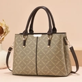 Oumifa shopper met monogramprint, bruine handgrepen en verstelbare schouderriem - Khaki/Koffie