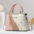 Elegant tricolor leather handbag with vintage floral print and decorative gold leaf pendant - Cream with Pink