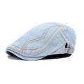 Stylish light blue washed denim newsboy flat cap featuring orange contrast stitching details - Adjustable / Blue & White